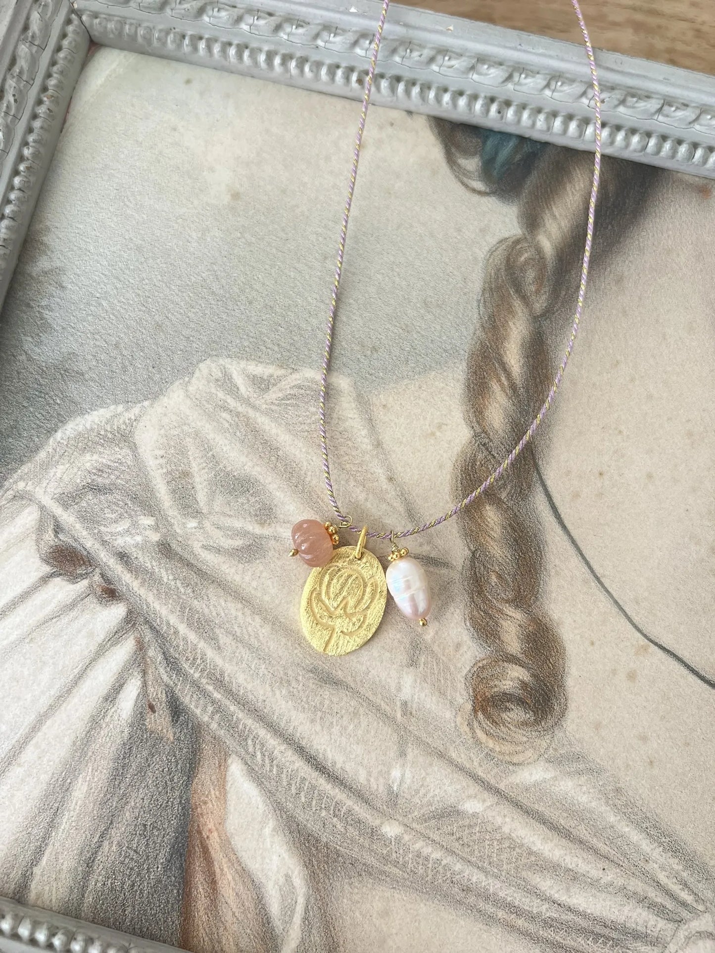 ojigi sautoir médaille perle de soleil