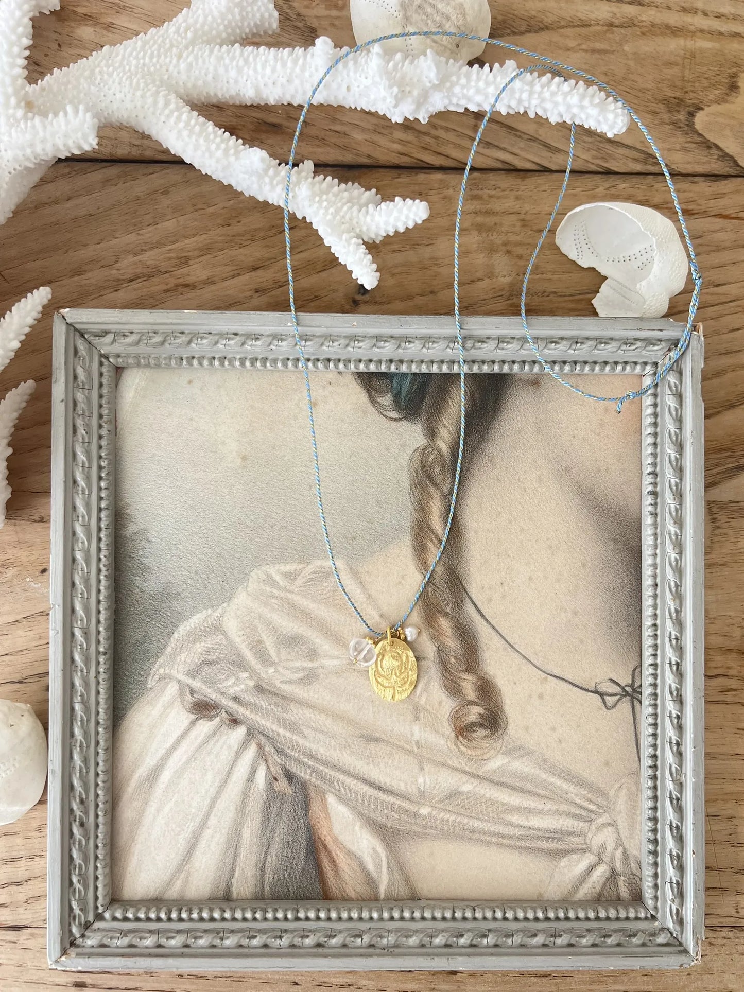 ojigi sautoir médaille cristal de roche