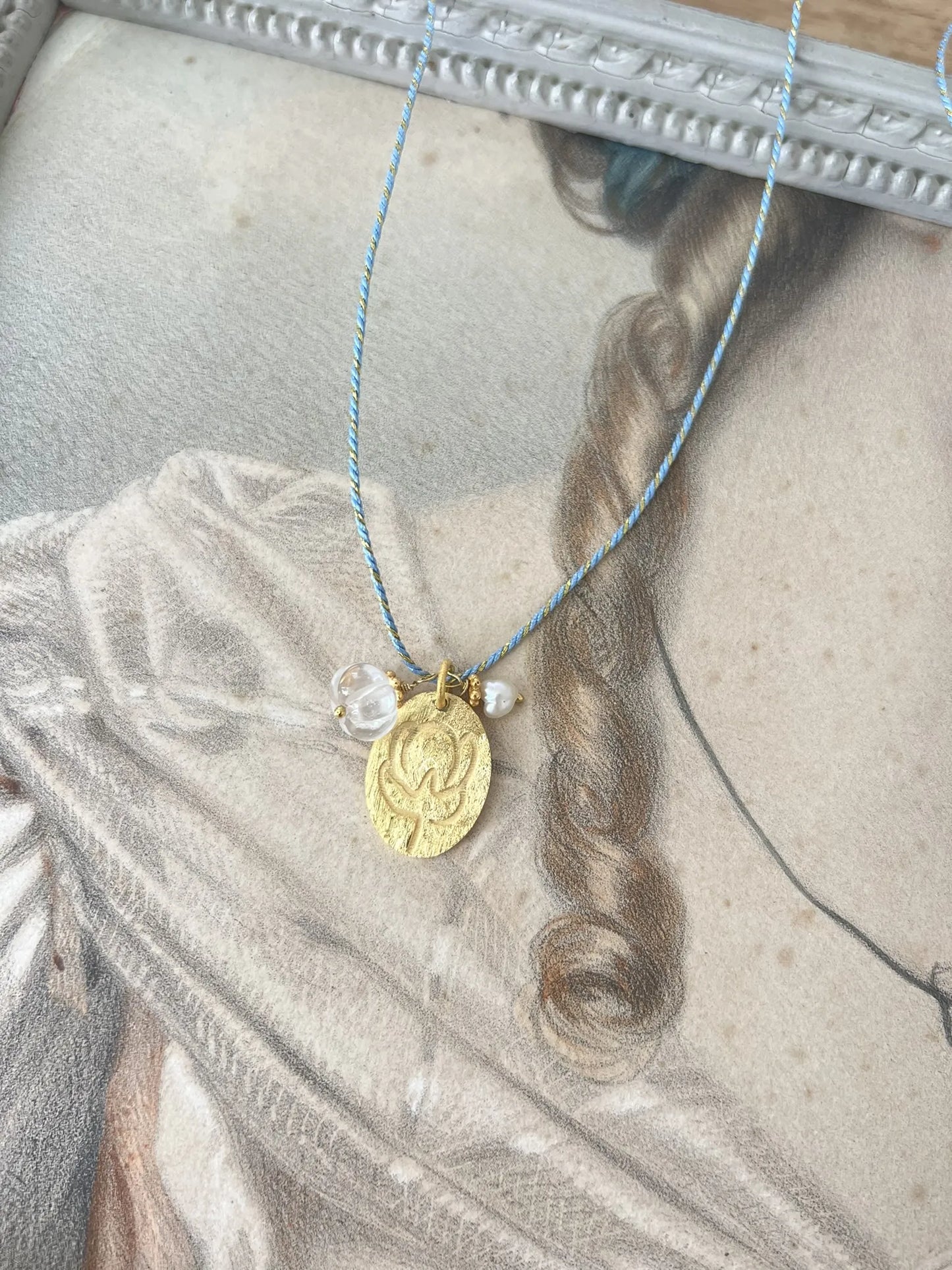 ojigi sautoir médaille cristal de roche