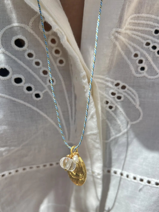ojigi sautoir médaille cristal de roche
