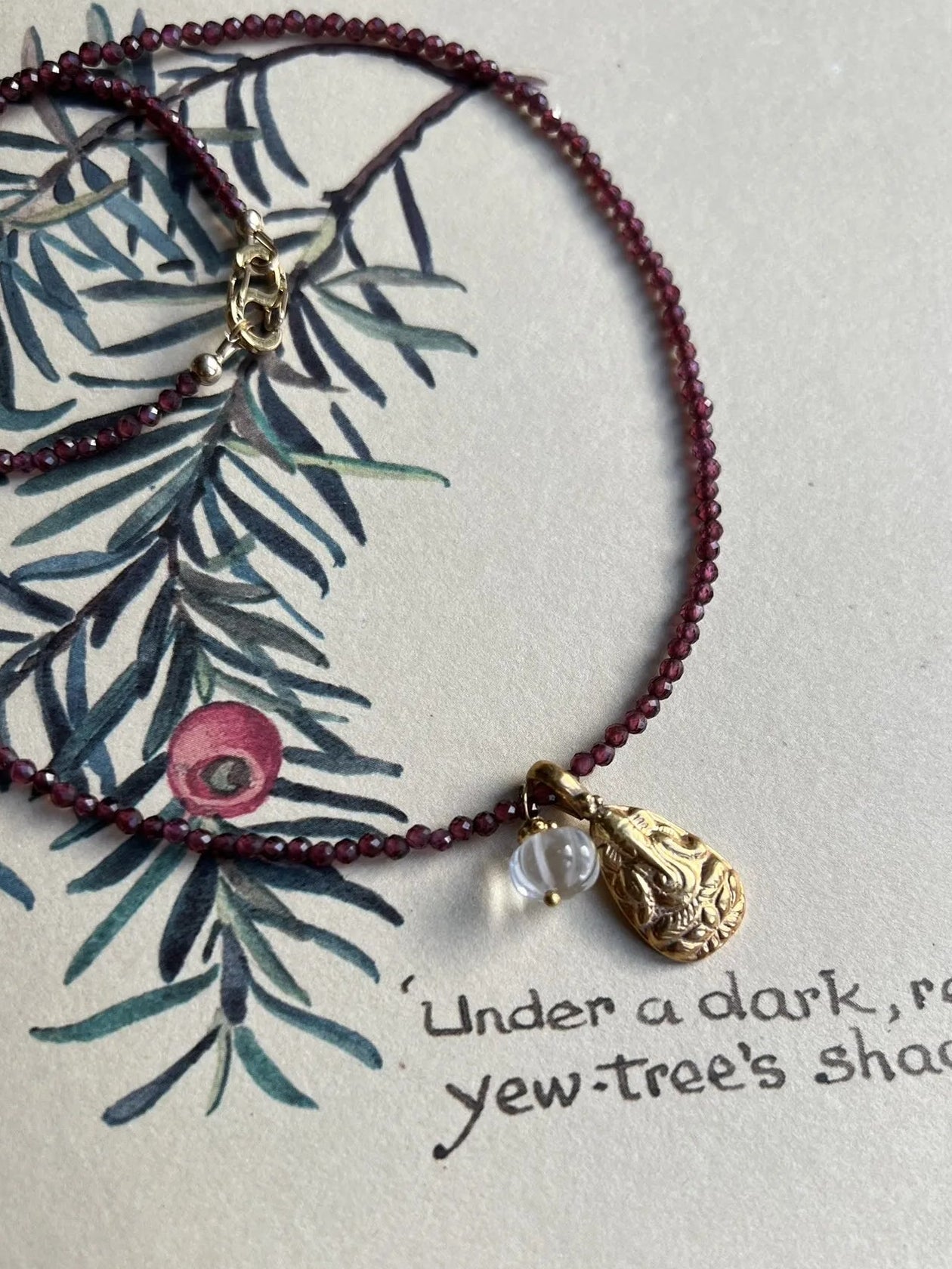 ojigi collier grenat amulette ganesh