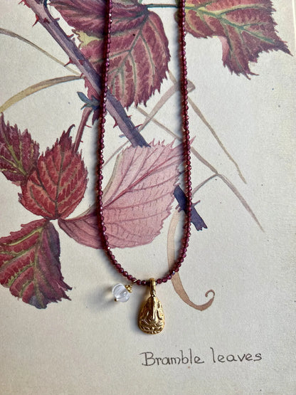 ojigi collier grenat amulette ganesh